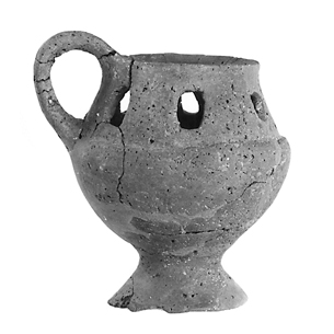Black and white photo of Figure 505. Jar with cut-outs (mankali): 223.24/HN 3548 from Tomb 223.