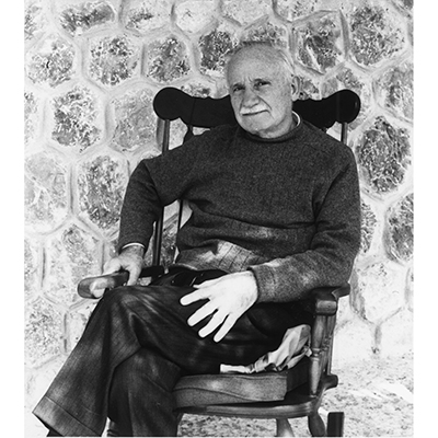Black and white photo of the frontispiece. Photograph of George E. Mylonas taken by his daughter at Mycenae, Easter 1975.