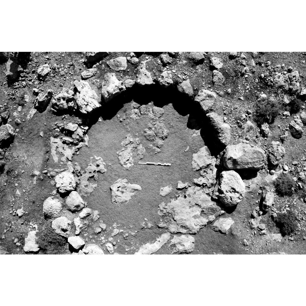 Black and white photo of Plate 4A. Tholos tomb: aerial view after removal of the burial stratum (Stratum III).